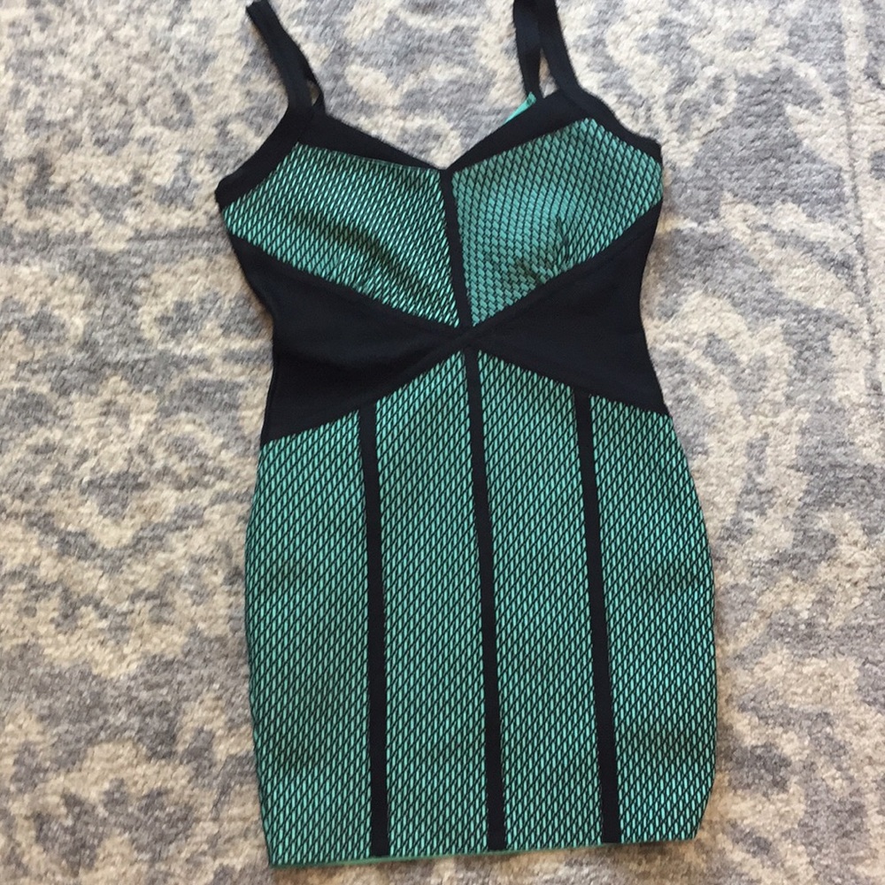 Form fitting teal dress